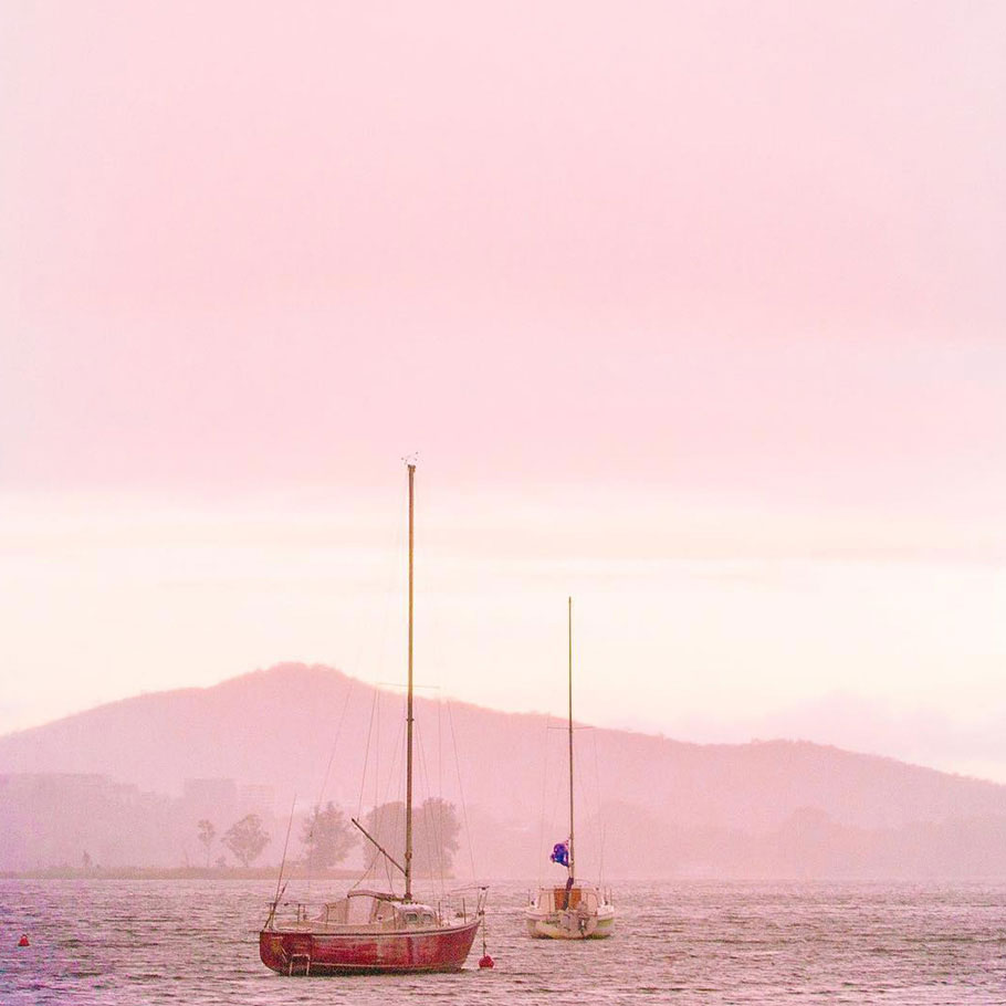 Yachts on the ocean in pink by Anton Kollo | Nikon Cameras, Lenses & Accessories