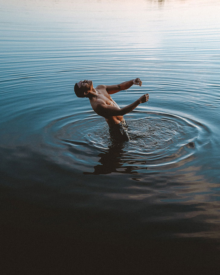 Man in water with ripples by Anton Kollo | Nikon Cameras, Lenses & Accessories