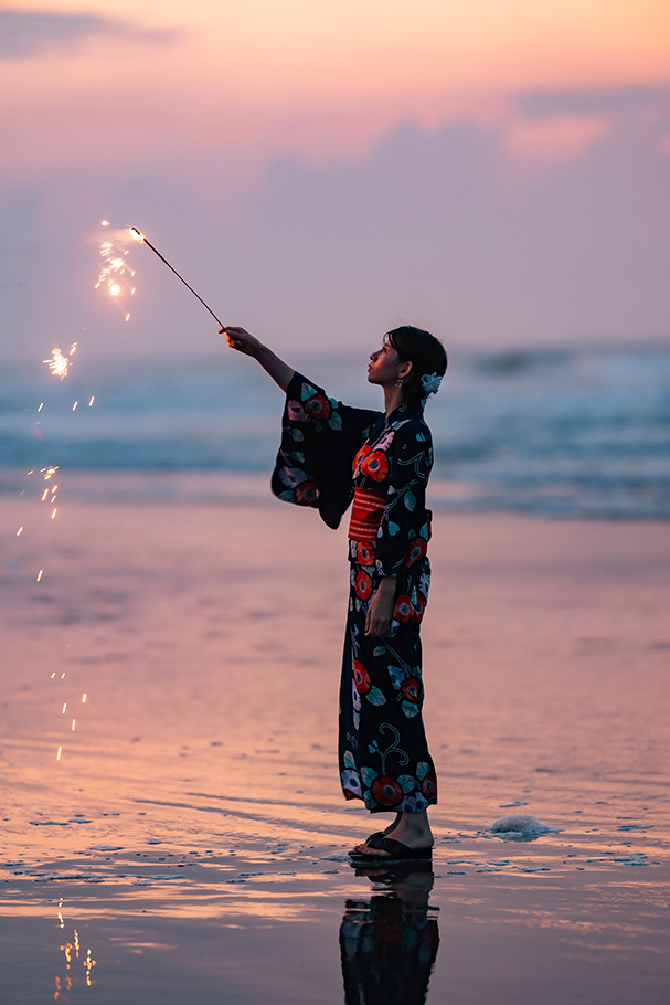 Girl with sparkler during sunset at the beach | Nikon Cameras, Lenses & Accessories